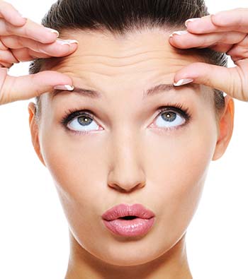 female face with wrinkles on her forehead